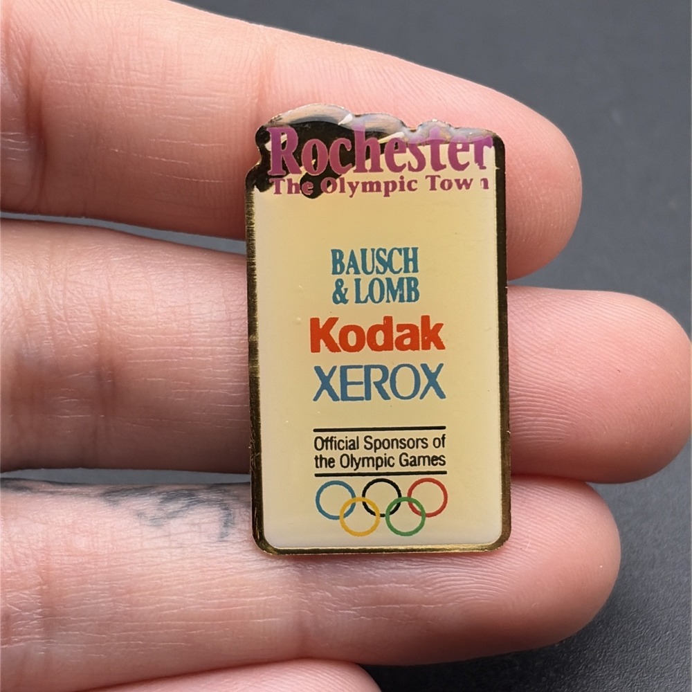 Rochester The Olympic Town Kodak Xerox Bausch & Lomb Sponsors Lapel Hat Pin‎